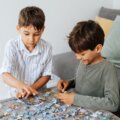 Trefl, Treflikék a dinoszauruszok világában puzzle 3 az 1-ben, 80 darabos